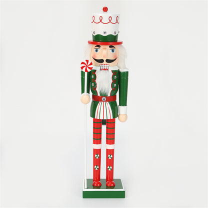 18 inch red and green christmas nutcracker soldier with lolly pop wearing white hat and green vest and red boots and red trousers 