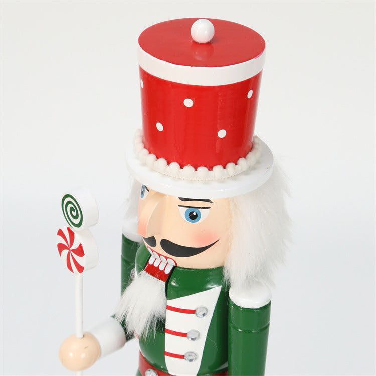 18 inch red and green christmas nutcracker soldier with lolly pop and candy cane wearing red hat and green vest and red boots-hat closeup 