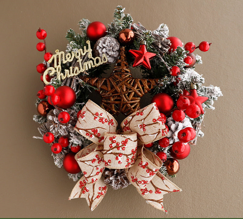Front door Christmas wreath haven with ribbon and ornaments