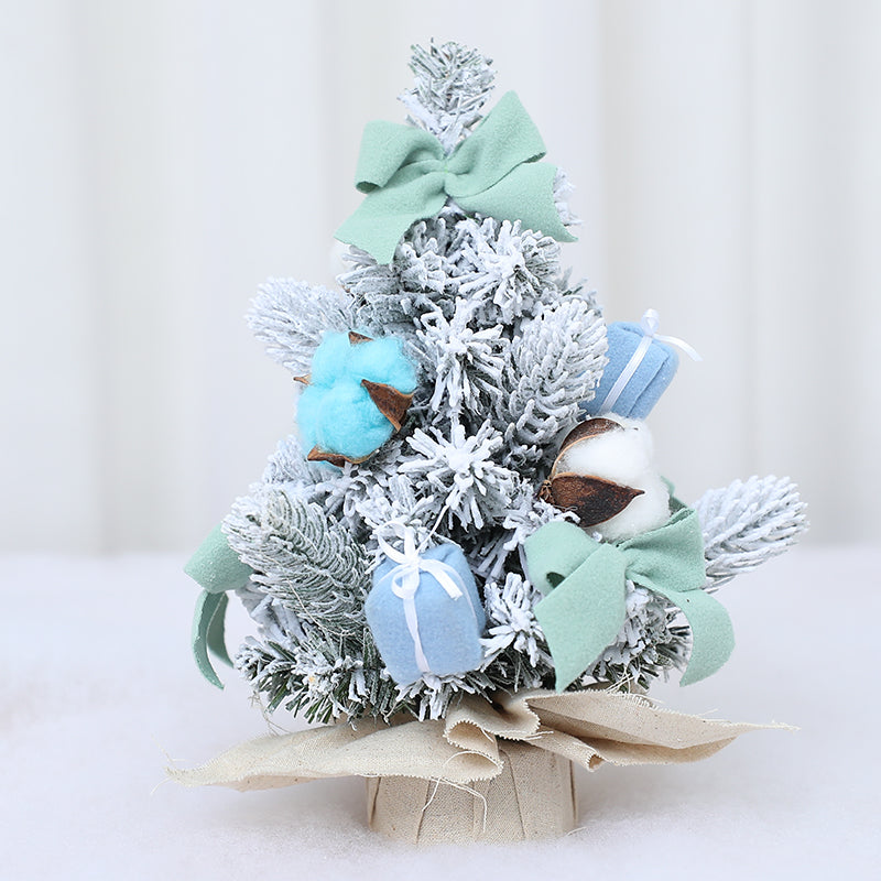 small artificial flocked pine tabletop christmas tree