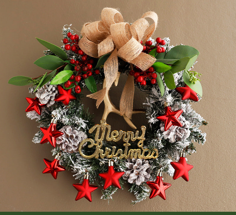 Front door Christmas wreath haven with ribbon and ornaments