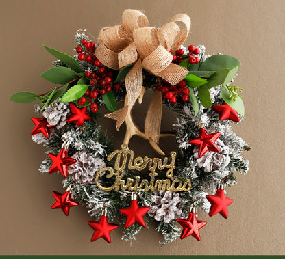 Front door Christmas wreath haven with ribbon and ornaments