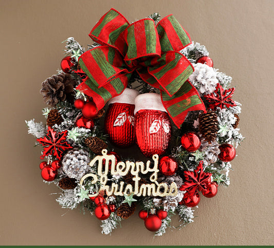 Front door Christmas wreath haven with ribbon and ornaments