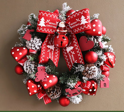 Front door Christmas wreath haven with ribbon and ornaments